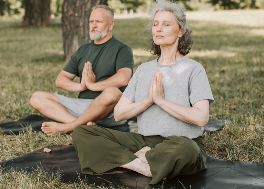 woman and man yoga easy seat