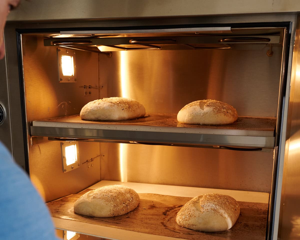 Baking bread dough in an oven.