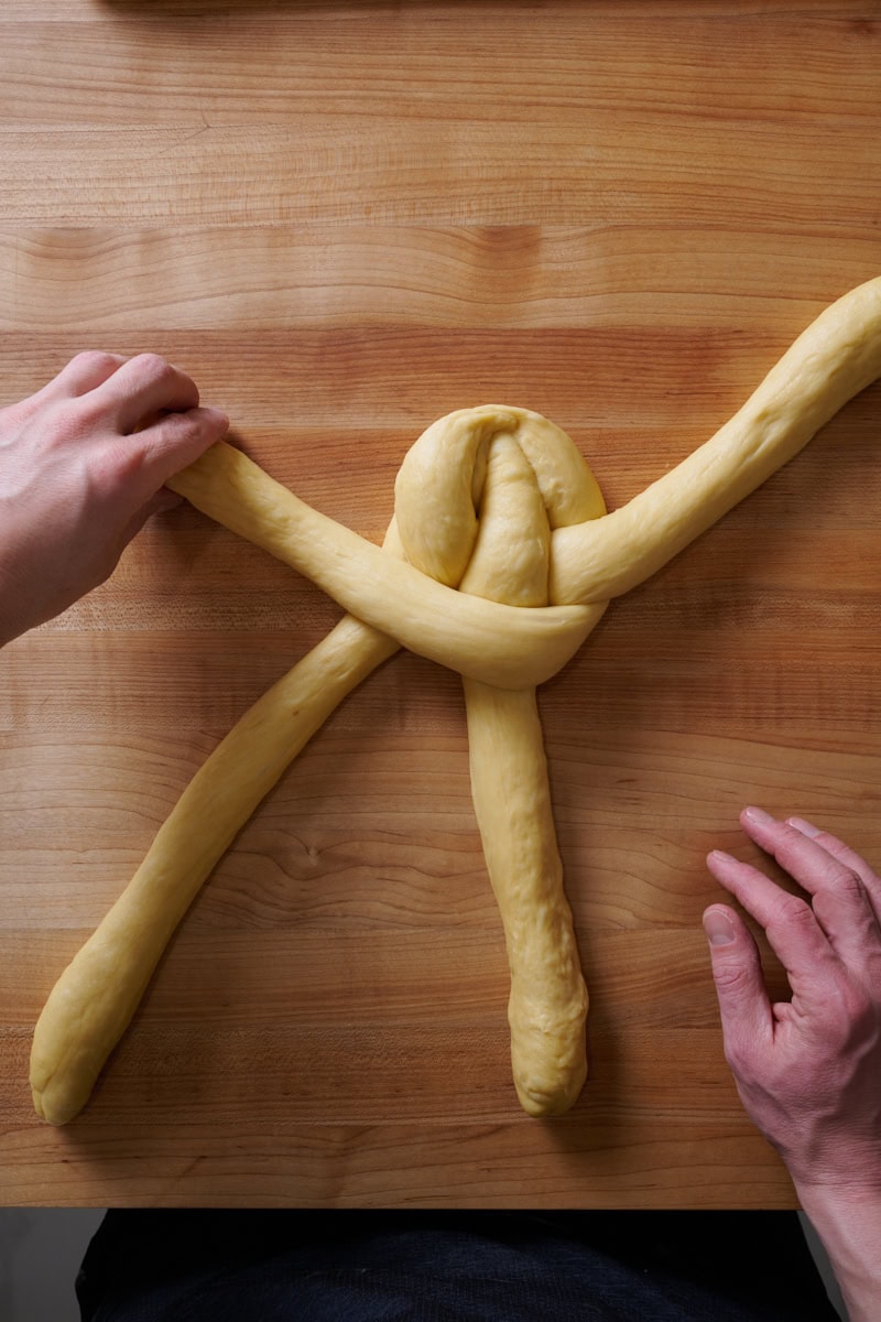 Braiding a 4 strand challah.
