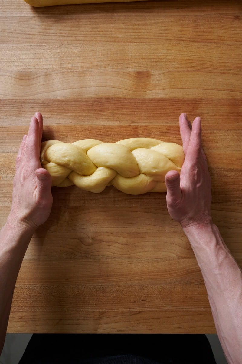 Braiding a 4 strand challah.