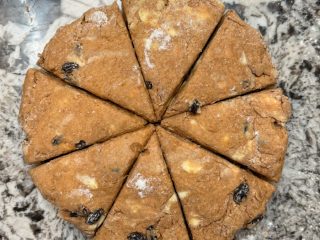 Sourdough discard pumpkin scones cut into triangles.
