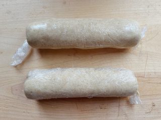 Rolled up cinnamon toast cookie dough ready for the fridge.